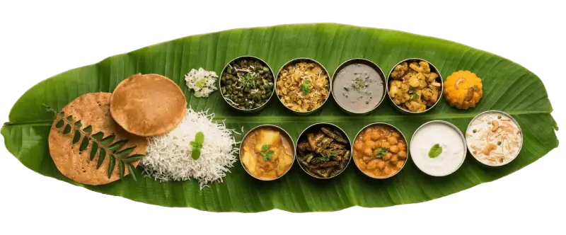 Traditional South Indian banana leaf meal served at Hotel Sidambaram